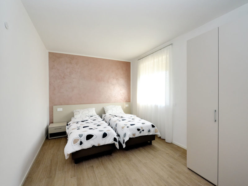 Appartamento-Olivo—Camera-da-letto—Agritur-Il-Melograno